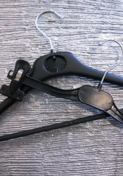 Clothes hangers in black or transparent plastic